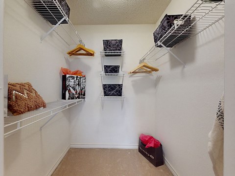 our spacious closets are equipped with shelves and baskets for your clothes