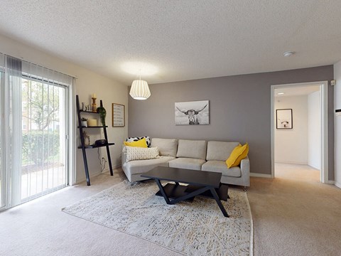 a living room with a couch and a table