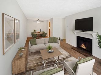 apartment living room filled with furniture and a fireplace