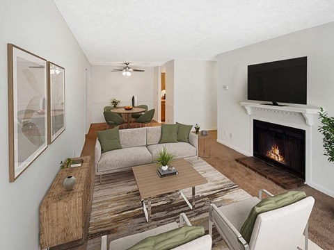 a living room with a couch and a fireplace