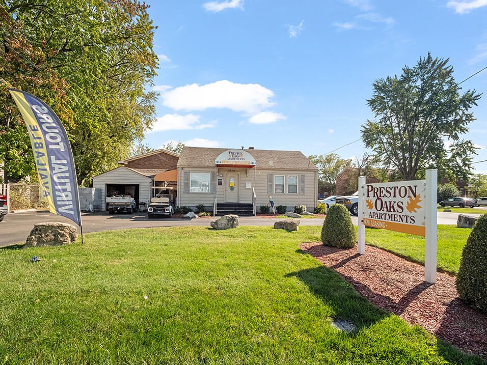 Sign outside of Preston Oaks Apartments in Louisville, KS
