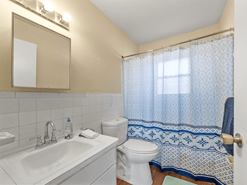 bathroom at Preston Oaks Apartments - Photo Gallery 7