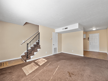 living room at Preston Oaks Apartments - Photo Gallery 3