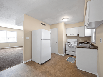 kitchen at Preston Oaks Apartments - Photo Gallery 2