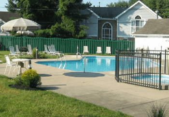 outdoor swimming pool at apartment community