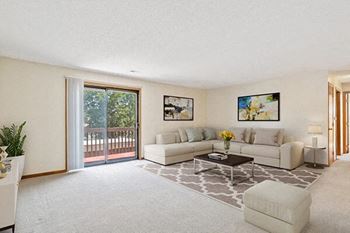 a living room with a couch and a table