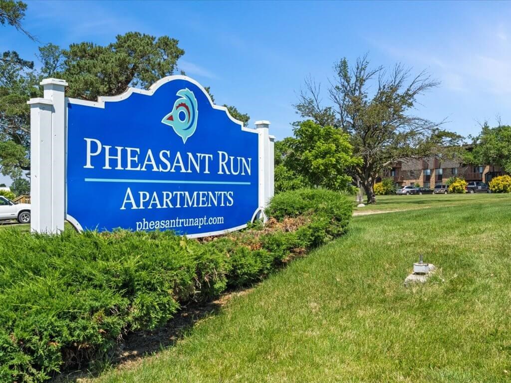 welcome sign at Pheasant Run Apartments