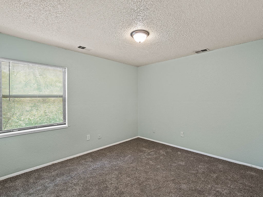 bedroom with a large window