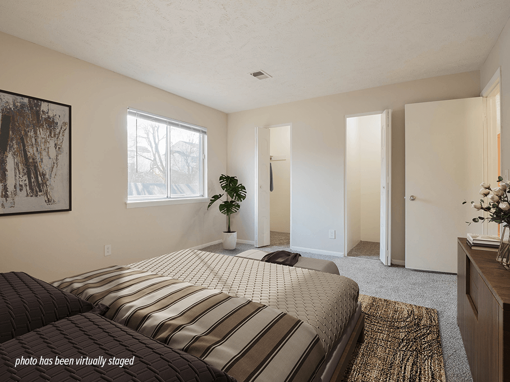 Apartment bedroom with walk in closet