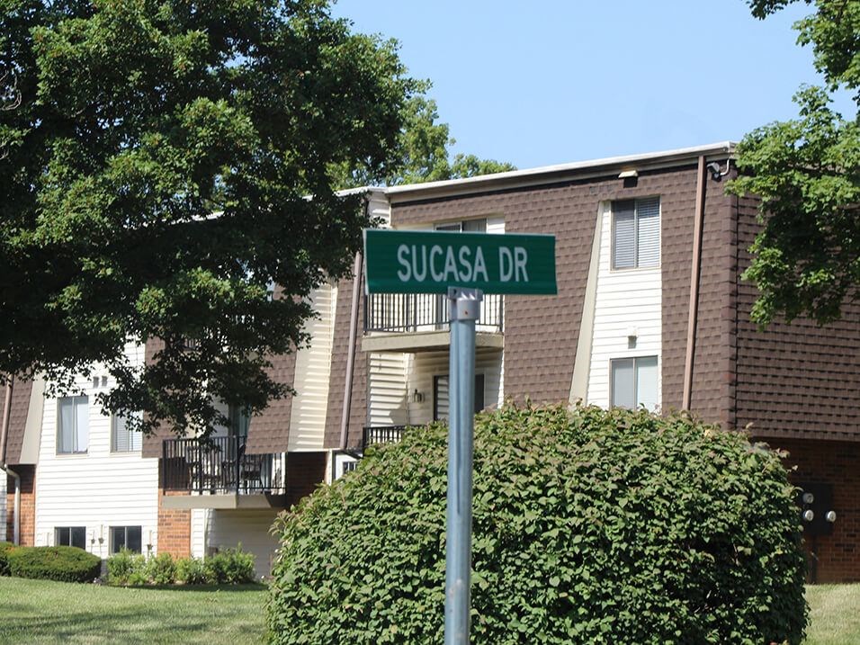 a street sign in front of a building