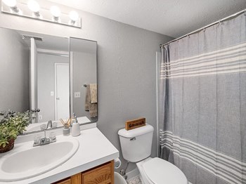Bathroom at Rising Estates Apartments - Photo Gallery 8