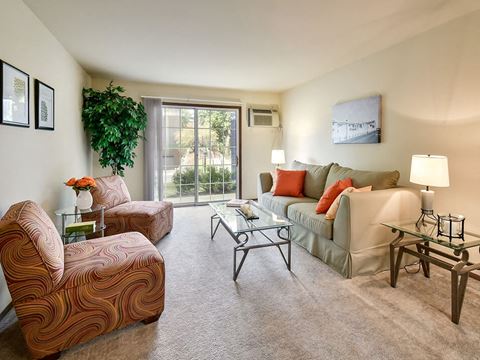 living room with natural light at river's edge apartments