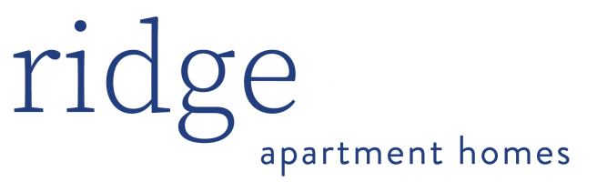 Ridgeoaks apartment homes logo with blue and white text.