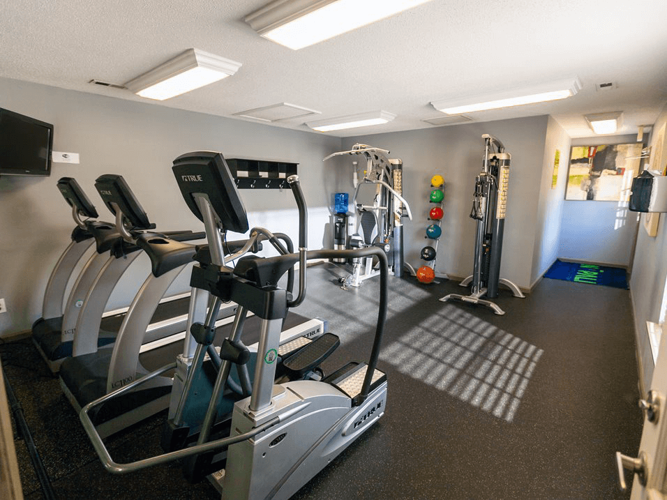 fitness center at apartment complex