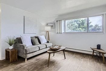 a living room with a couch and a table