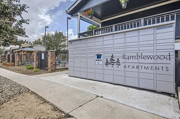 a white fence in front of a building