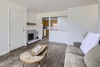 a living room with a couch and a table