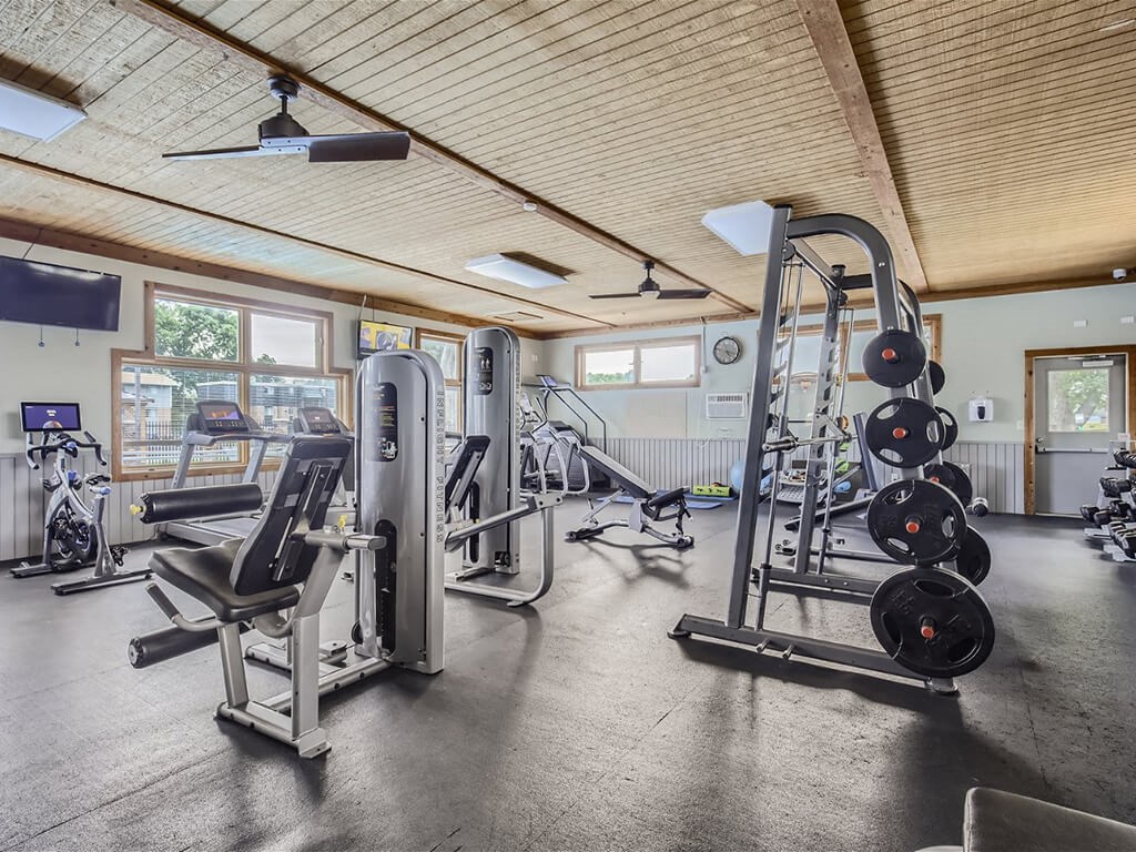 Fitness Center with free weights at apartment community