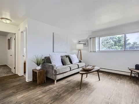 a living room with a couch and a table