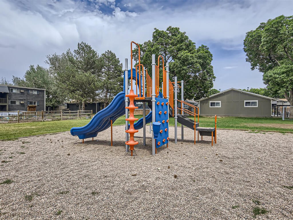 playground with slide at apartment community