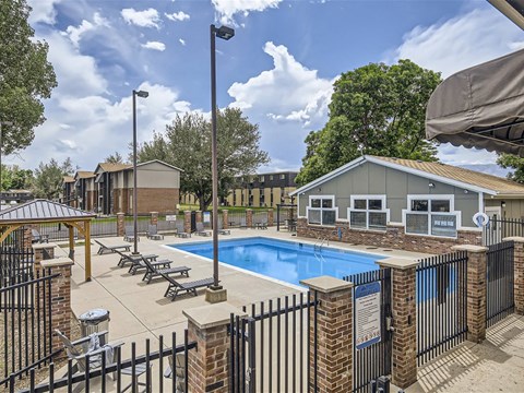 our apartments have a resort style pool with lounge chairs