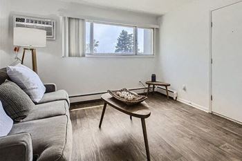a living room with a couch and a table