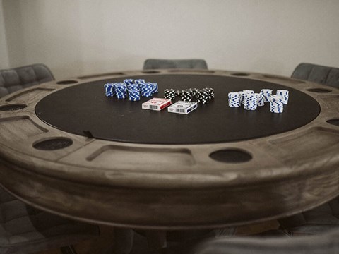 a poker table with chips and cards