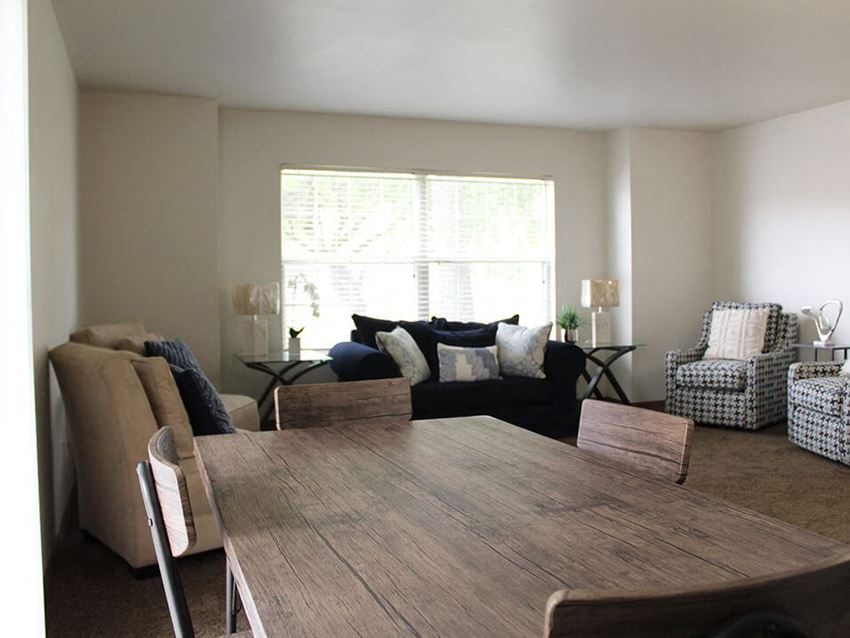 a living room with a large window - Photo Gallery