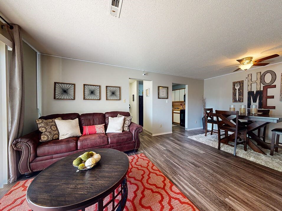 apartment living room with a couch and a table