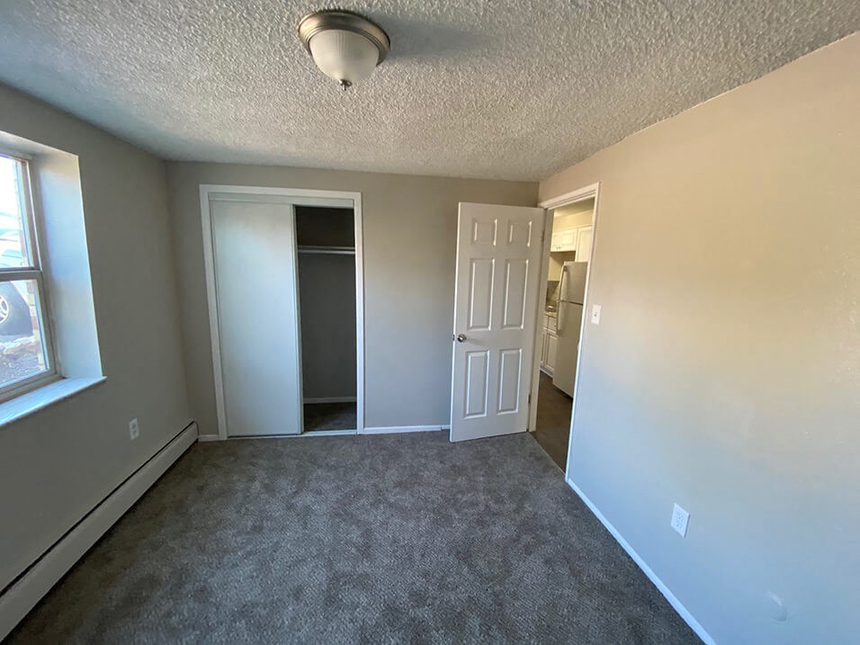 apartment bedroom with closet