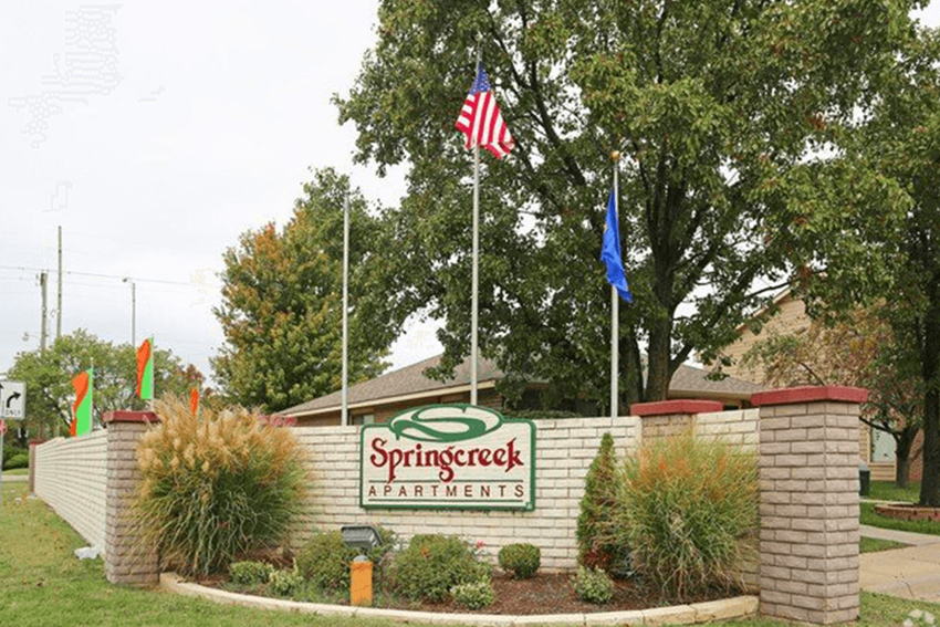 welcome sign for Springcreek Apartments - Photo Gallery 1