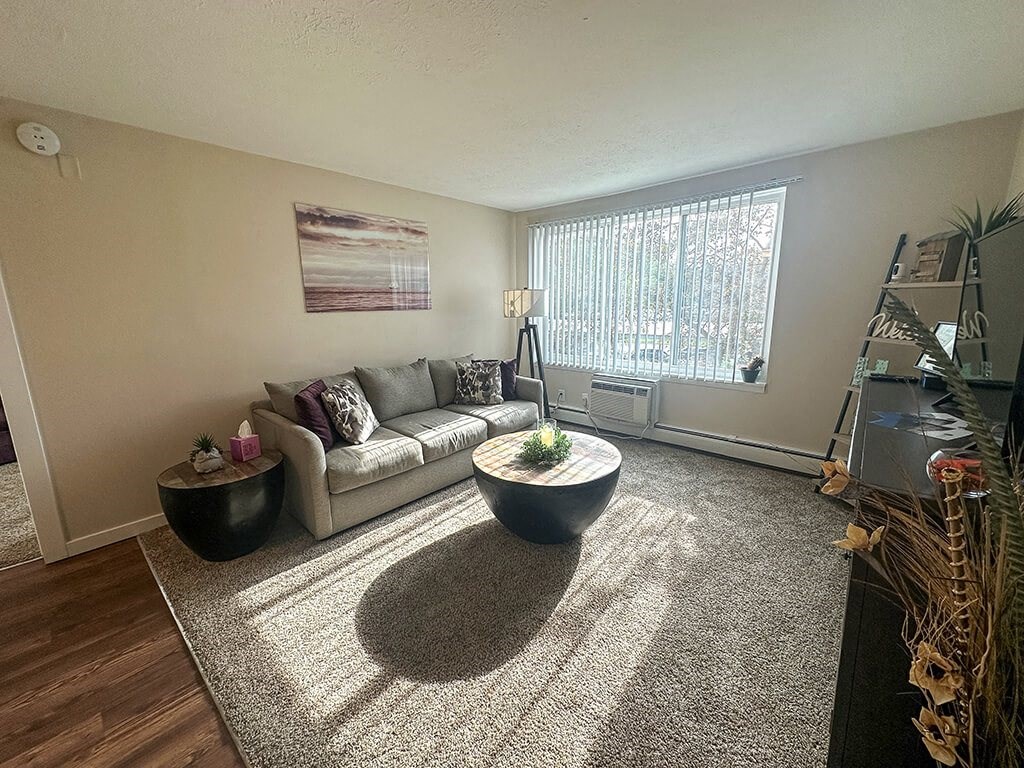 a living room with a couch and a table