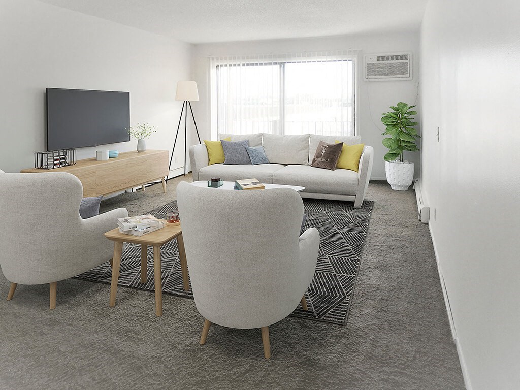 a living room with two chairs and a couch