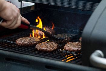 apartment complex with outdoor grill