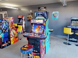 a room filled with video games and arcade games