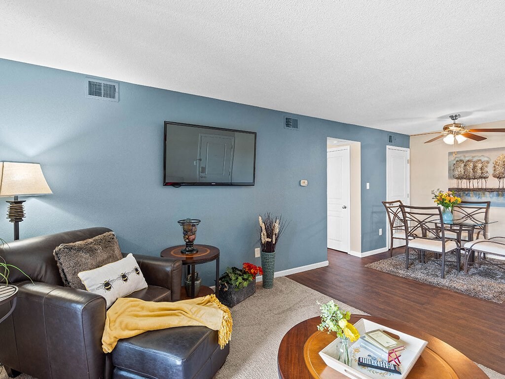 a living room with wood-style flooring
