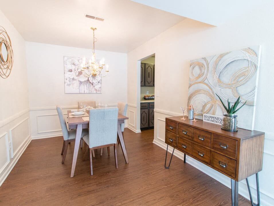 dining area with wood style flooring in apartment unit