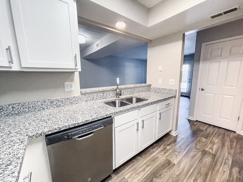 Kitchen with window overlooking the living room 