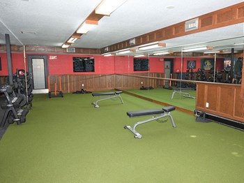 well equipped gym at tourville apartment - Photo Gallery 8