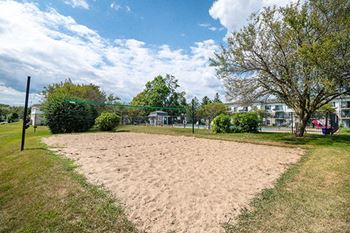 sand volleyball court at New Fountains Apartments
