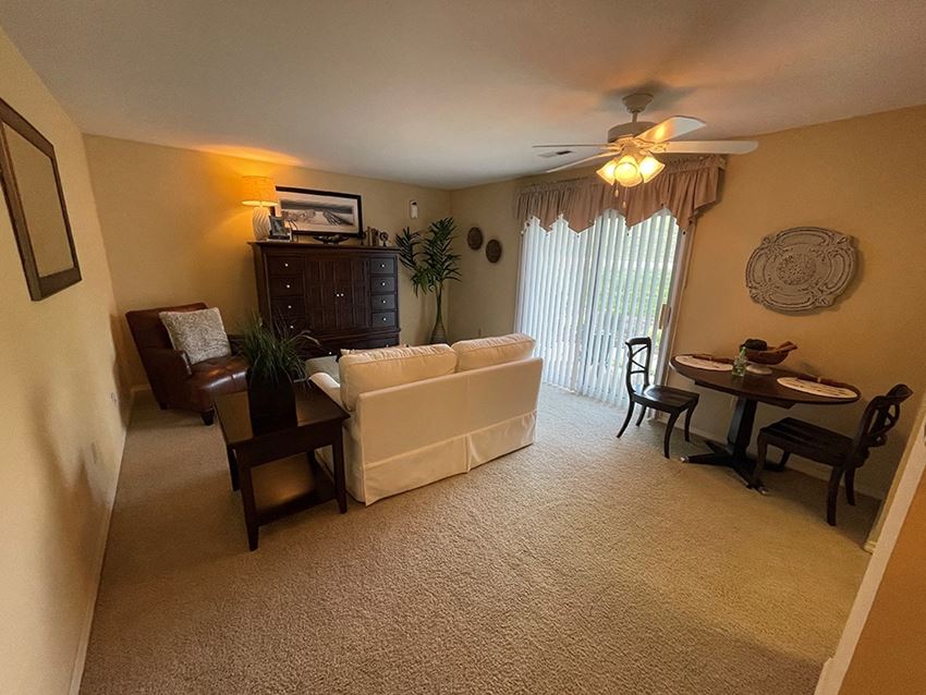 a living room with a patio - Photo Gallery