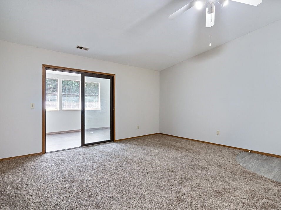 apartment living room with a sliding glass door