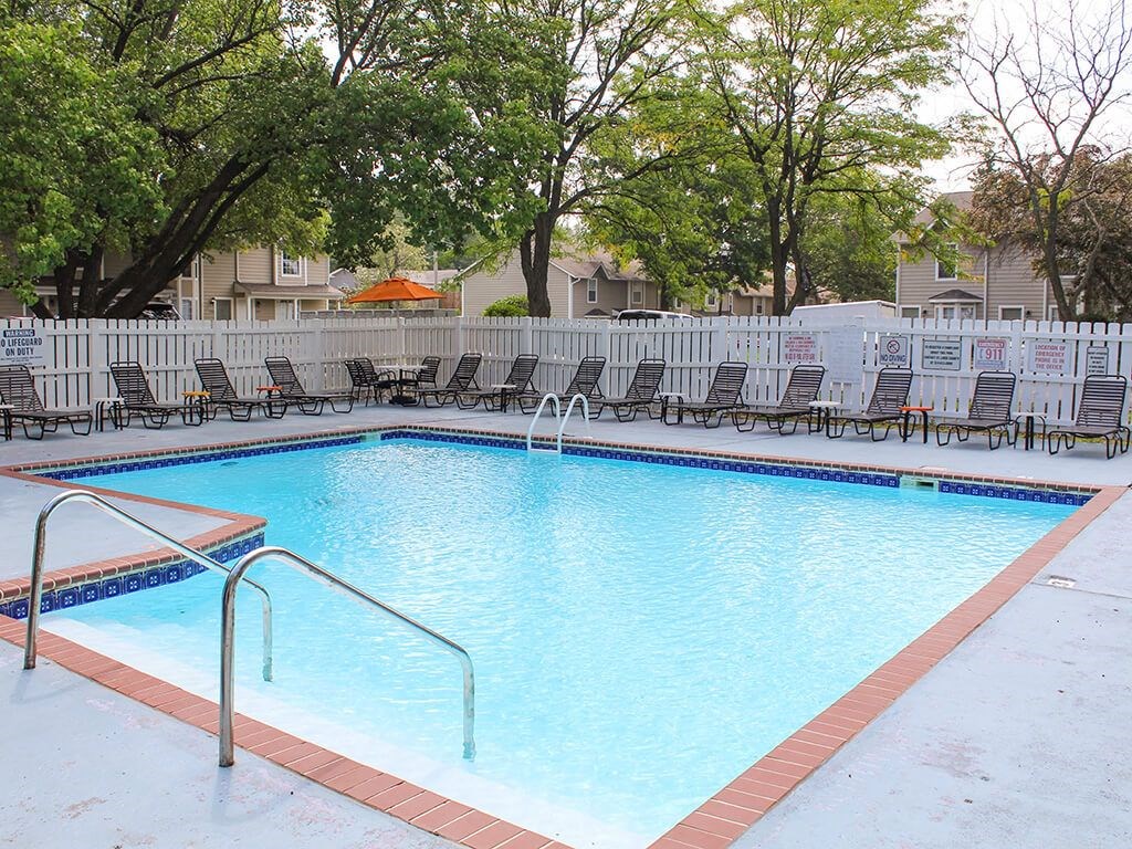 outdoor swimming pool at apartment community