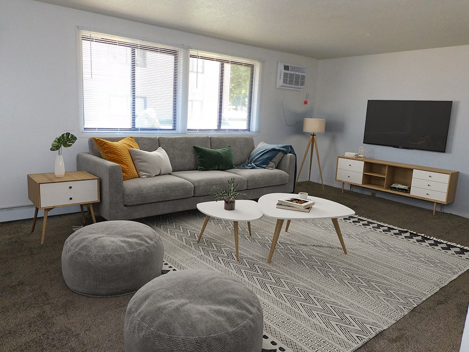 living area with windows with lots of natural lighting