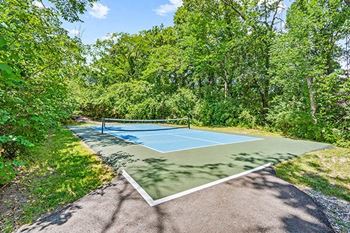 a tennis court with a net on top of it