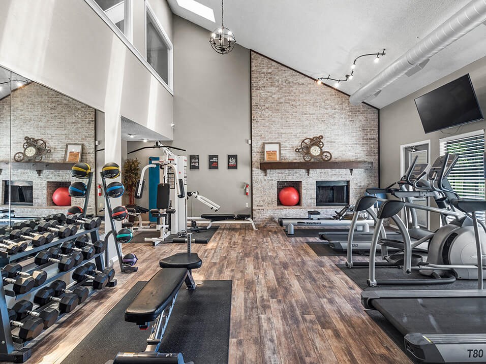 apartment complex gym with weights and cardio