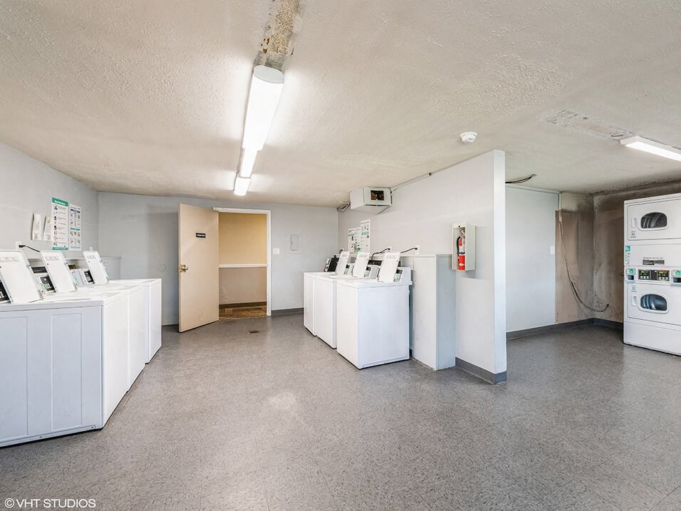 laundry room with washer and dryer machines