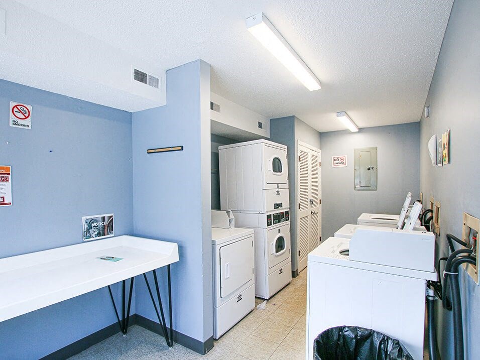 a laundry room with a washer and dryer