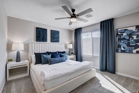 Bedroom With Ceiling Fan at Copper Creek Apartments, Nevada 