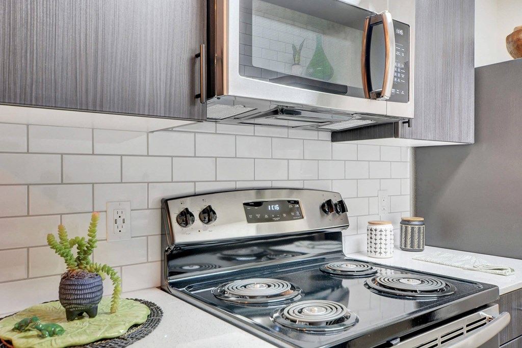 Electric Range In Kitchen at Namaste Apartments, Nevada